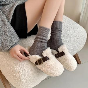 Cosy off-white fleece clogs with adjustable leather strap and warm grey knit socks