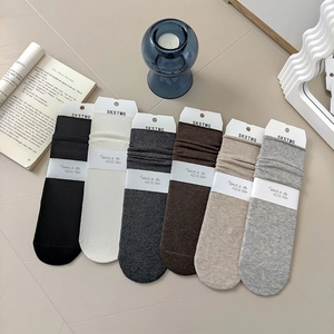 Set of six colorful ribbed cotton mid-calf socks with premium packaging and gift tags