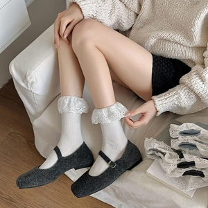 Sweet Lolita white cotton crew socks with lace trim paired with grey Mary Jane shoes