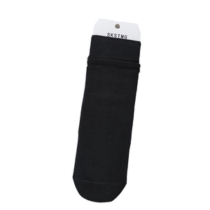 Classic black knitted cotton socks for women with ribbed cuffs and original packaging