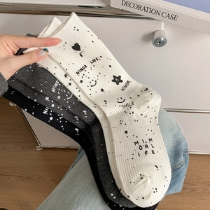 Three-pack cotton mid-calf socks with graffiti smile print in white, grey, and black colors