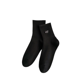 Mid-calf black cotton socks with white heart embroidery and Hi text on white background