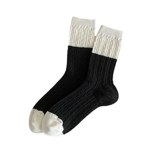 Classic black and white color-block cable knit crew socks for women in minimalist style