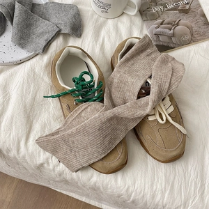 Japanese style ribbed knit cotton calf socks in grey and khaki shown with sneakers