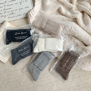 Detailed set of 6 pairs of cotton knit mid-calf socks in various neutral tones