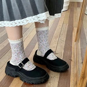 French style floral socks with ruffle trim and black platform Mary Jane shoes