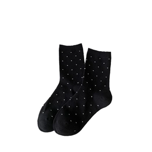 Sweet Japanese style black crew socks with white polka dots and delicate mesh lace trim