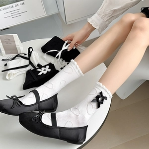 Japanese JK style white heart texture mid-tube socks with black bows and wavy cuffs