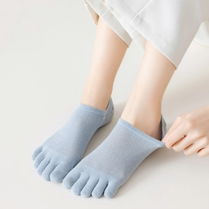 Detail of light blue mesh toe socks with breathable holes and five-finger split design