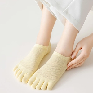 Women's yellow mesh five-toe socks with non-slip silicone heel and breathable design