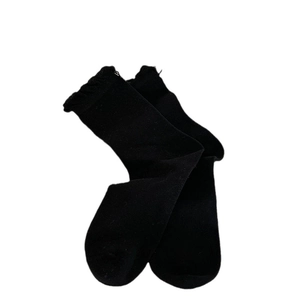 Minimalist black crew socks for women featuring ruffled edges and simple solid color design