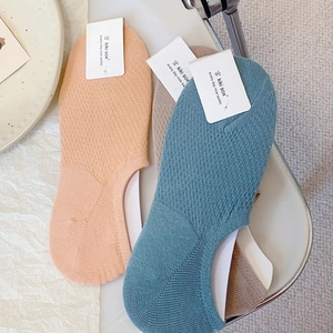 Detailed knit texture of breathable mesh low cut liner socks in solid colors