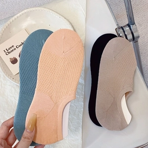 Detail of mesh breathable no-show socks with non-slip silicone heel grip for women