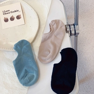 Three pairs of mesh breathable no-show socks in light blue, beige, and black colors