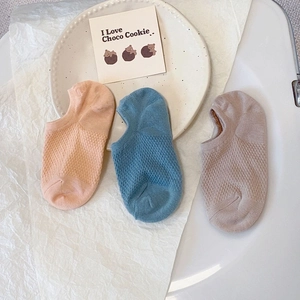 Three pairs of breathable mesh no-show socks in pastel pink, blue, and taupe colors