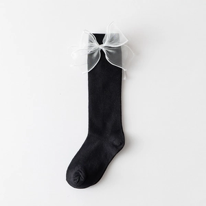 Japanese style black knee high socks with white 3D mesh bow ties on white background