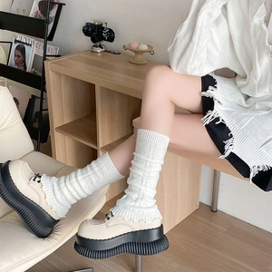 White knitted leg warmers with vertical ribs and ruffled edges for JK style fashion
