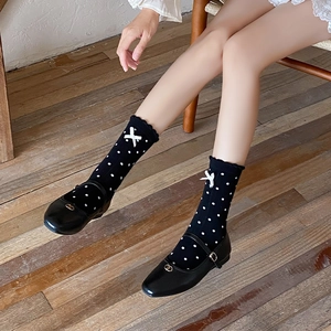 Japanese style black polka dot socks with cute white bows and Mary Jane shoes
