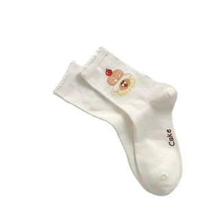 Cute white crew socks with colorful cake embroidery and wavy lettuce edge trim for women