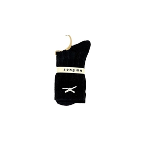 Black knit mid-calf socks with white bow and pearl detail in retail packaging
