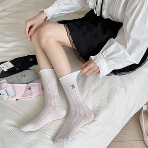 Women's ballet style mesh crew socks with bow embroidery and diamond hollow pattern