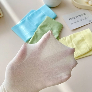 Macro shot showing ultra-thin breathable fabric and high elasticity of summer nylon socks