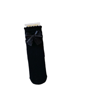 Sweet ballet style black mid-calf socks with lace bows and ruffled trims for women