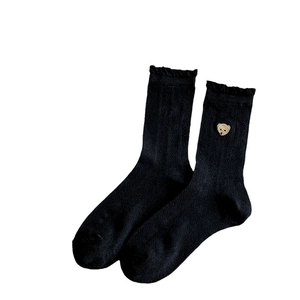Chaussettes résille pour femmes avec broderie ours et bordure à volants noire