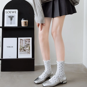 Japanese style white polka dot mid-calf socks with ruffle trim and silver Mary Janes