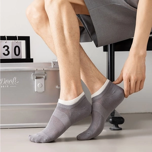 Light gray breathable mesh ankle socks for men with white ribbed cuffs for casual daily wear
