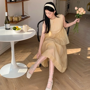 Detail of sheer mesh socks with daisy embroidery paired with beige Mary Jane shoes