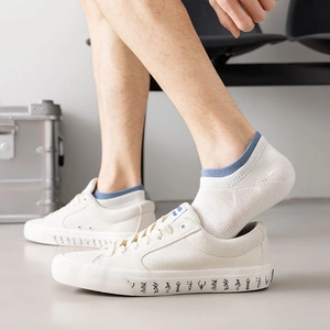 Close-up of men's breathable mesh low-cut socks with unique blue trim and symbol decor sneakers