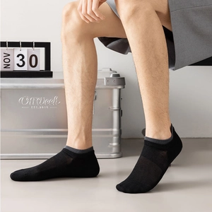 Detail of men's low cut mesh socks featuring breathable knit texture and contrast grey trim