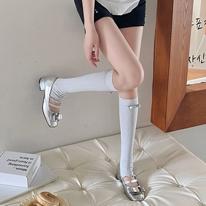 Silver Mary Jane shoes with glittery bow socks and metallic buckle detail for women