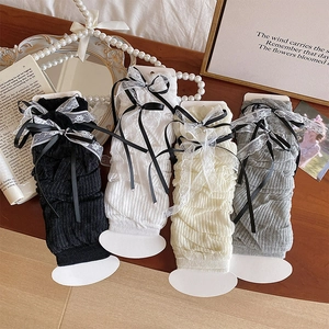 Scaldamuscoli stile balletto con pizzo e fiocchi in nero, bianco, beige e grigio