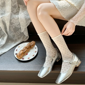 Sweet white mesh mid-calf socks with pink heart embroidery and silver Mary Jane shoes