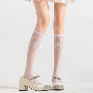 Detailed view of white Lolita lace knee-high socks featuring cute bow and mesh pattern