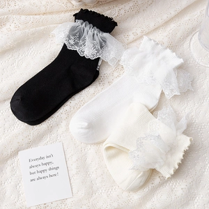 Three-pack of sweet Lolita mid-calf socks with delicate lace edges and floral embroidery
