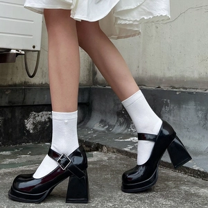 Retro black patent leather Mary Jane platform shoes with chunky heels and square buckle strap