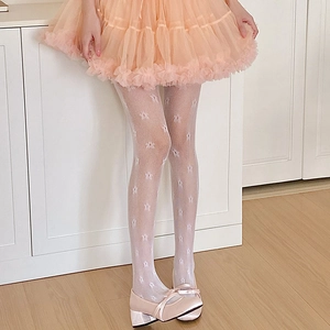 Close-up of white star pattern jacquard on breathable lace mesh Lolita tights
