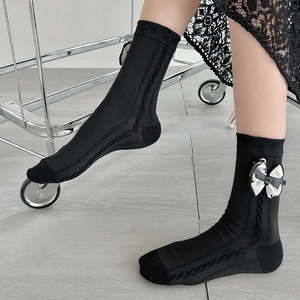 Japanese style black crew socks with ribbon bow and cable knit pattern for women