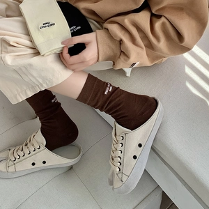 Three pairs of stylish knit flip-flop socks with letter embroidery and canvas shoes