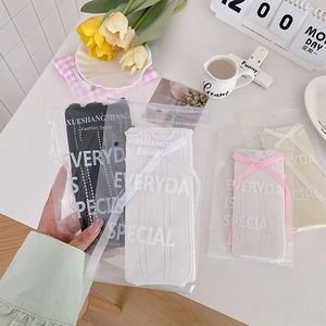 Detail of Lolita style knit socks with bow tie in premium frosted gift packaging