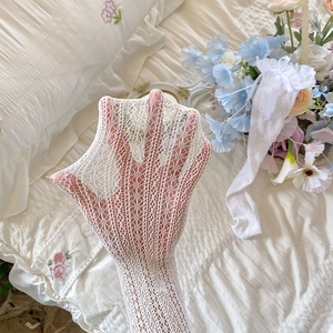 Detail showing high-elastic white lace mesh texture and hollow pattern of the sock