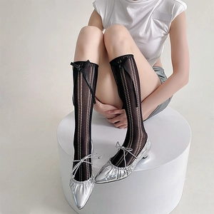 Japanese Lolita style knee high socks with black mesh hollow out design and bow detail