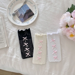Chaussettes hautes avec dentelle, nœuds roses et maille ajourée en trois tons