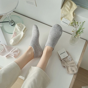 Women's low-cut knit socks in multiple colors featuring cute speckled dot yarn design