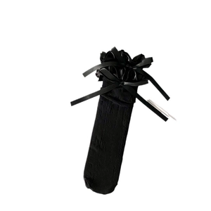 Chaussettes hautes Lolita noires avec volants en dentelle et nœuds en satin doux