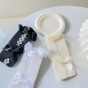 Lolita hollow mesh knee-high socks with chiffon ruffles and satin bows for girls