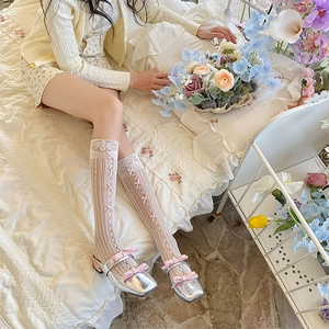 Chaussettes mi-mollet en dentelle avec nœuds roses et maille évidée style Lolita